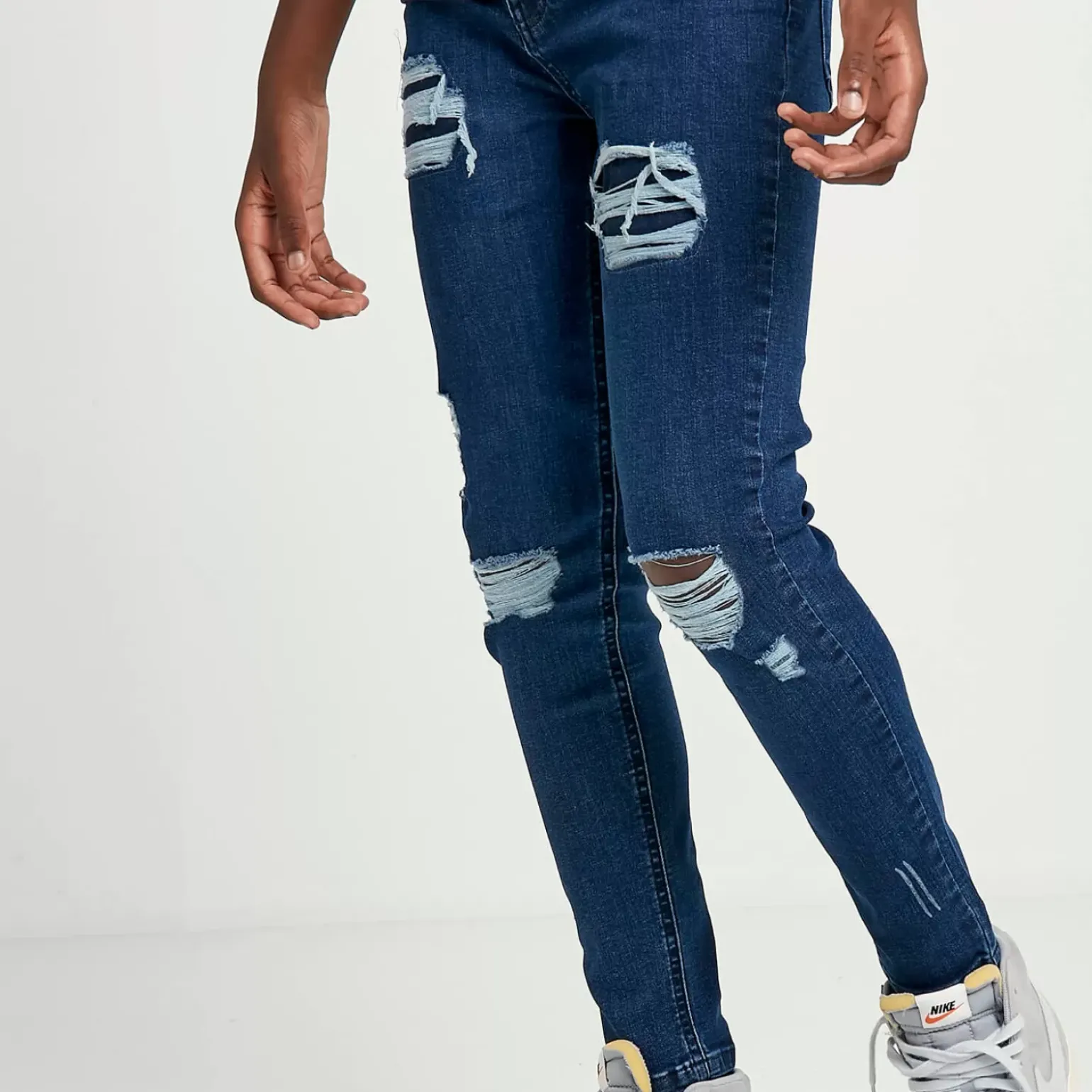 11 Degrees Junior Sustainable Distressed Skinny Jeans – Mid Blue Wash