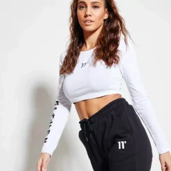 11 Degrees Womens Cropped Long Sleeve Graphic T-Shirt – White